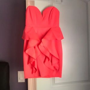 Mini coral dress with v-neck bodice